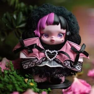 Charming Pink and Black Doll with Heart Cape